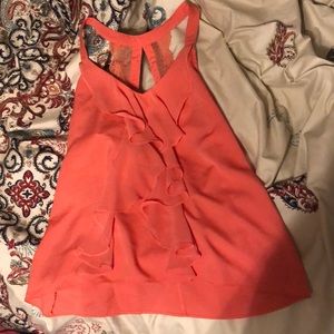 peach coloured lace and ruffed tank top